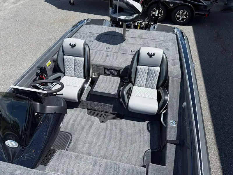 Slide: The Image of 2026 Phoenix 721 ZXL boat interior with dual seats and steering console. - 11