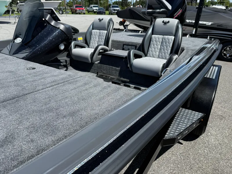 Slide: The Image of 2026 Phoenix 721 ZXL boat interior with dual seats and sleek design. - 4