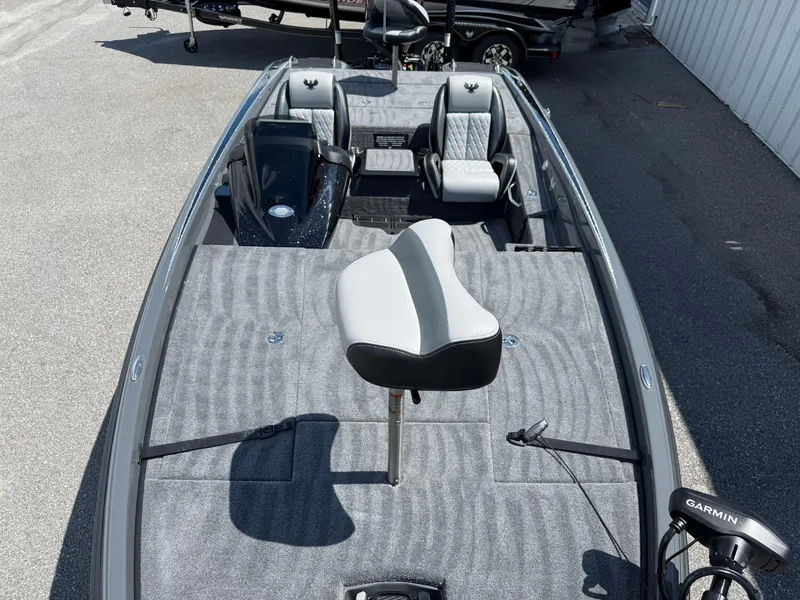 Slide: The Image of 2026 Phoenix 721 ZXL fishing boat with gray interior and Garmin equipment. - 8