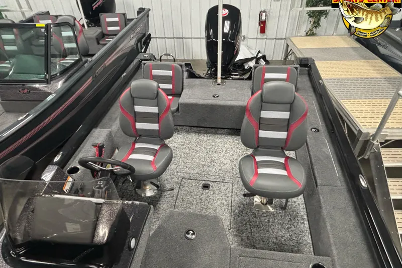 Slide: The Image of 2025 Ranger VS1782SC Reata boat interior with gray and red seating, steering console, and motor. - 6