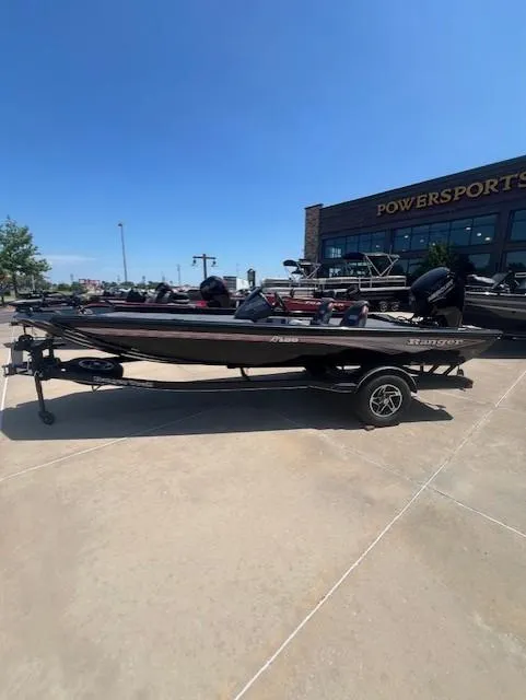 The Image of 2025 Ranger RT188 boat on trailer outside Powersports dealership. - 0