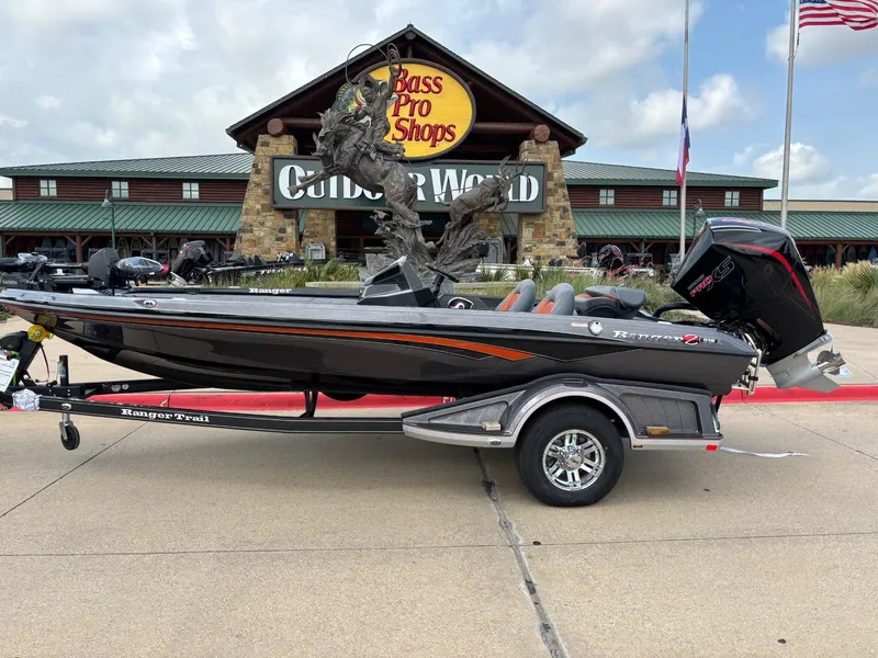 The Image of 2025 Ranger Z518 Cup-Equipped boat on trailer, parked outdoors. - 0