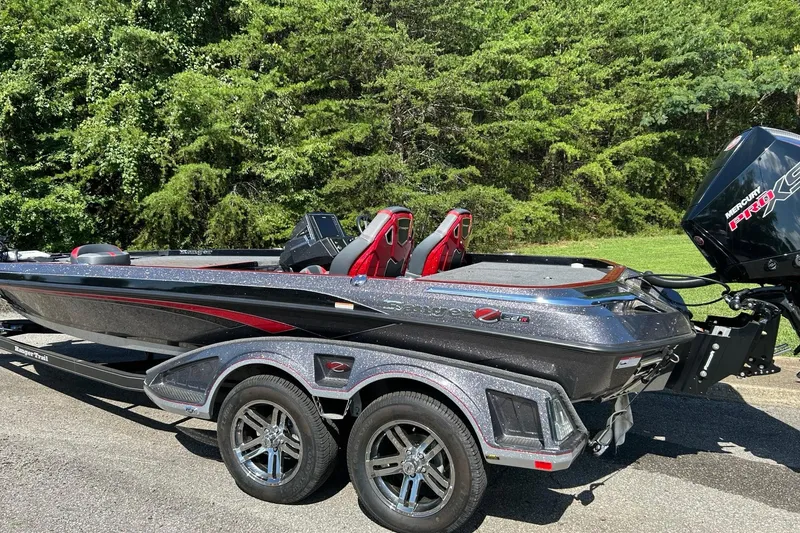 Slide: The Image of 2025 Ranger Z521R Cup-Equipped boat with sleek design, parked on a trailer. - 1