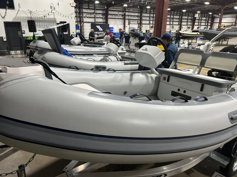 Slide: The Image of Highfield Classic 400 inflatable boat, 2025 model, displayed indoors at a showroom. - 9