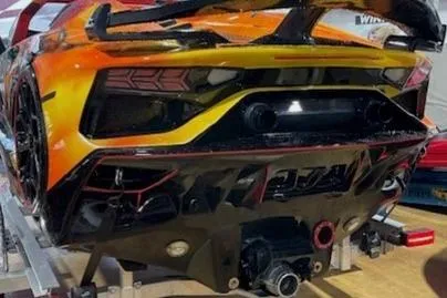 Slide: The Image of 2024 Watersports Car SERIES-L, vibrant rear view with aerodynamic design and sleek features. - 11