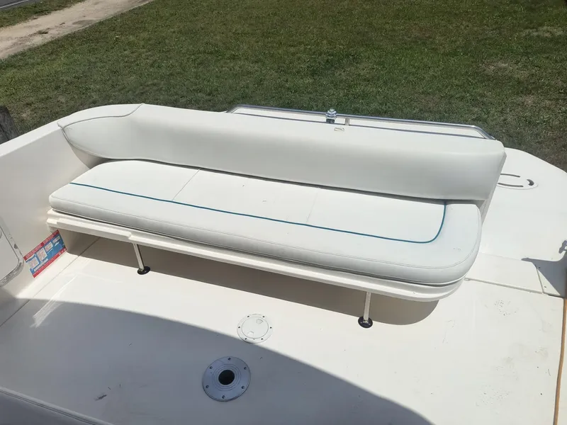 Slide: The Image of White seating area on a 1995 Sea Ray 330 Sundancer boat. - 5