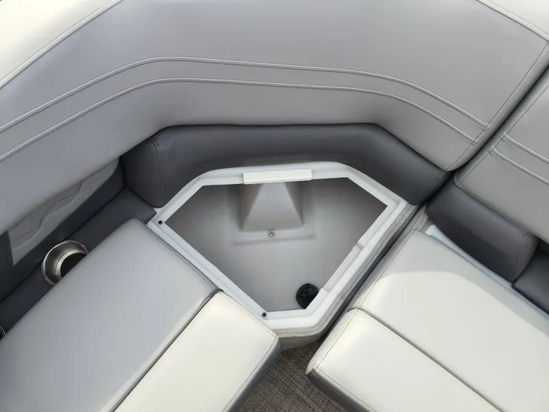 Slide: The Image of SunCatcher Fusion 322C 2025 boat seating with built-in storage compartment. - 23