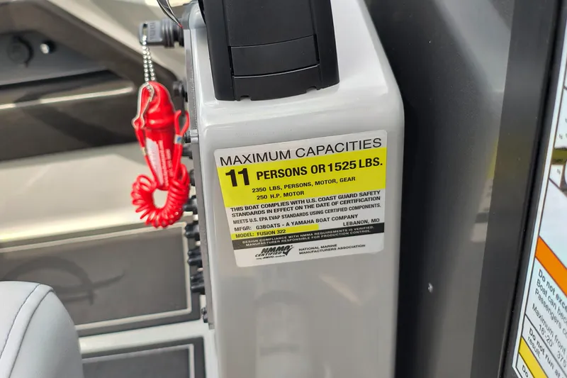 Slide: The Image of Capacity label on 2025 SunCatcher Fusion 322C boat, indicating 11-person or 1525 lbs limit. - 33