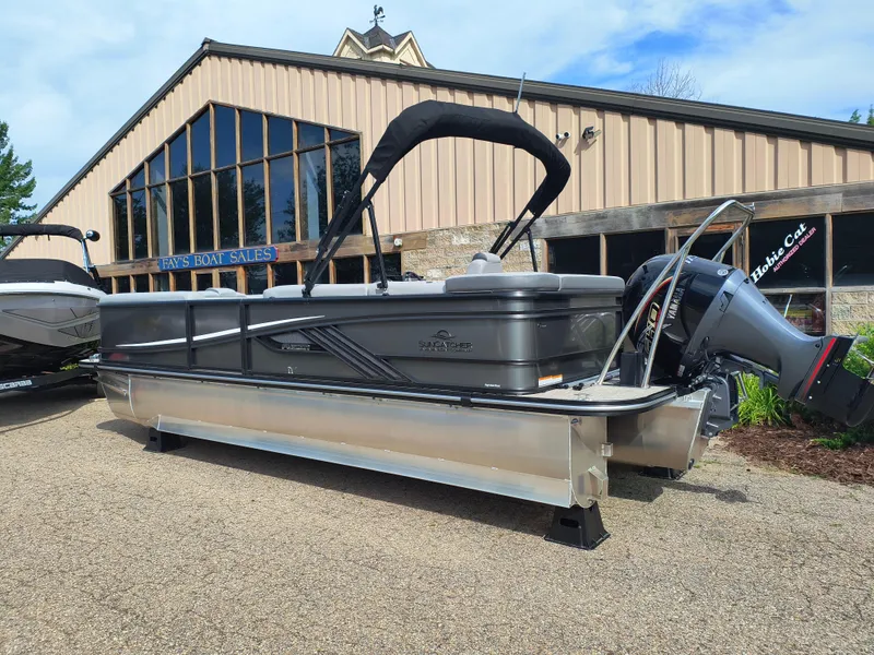 Slide: The Image of 2025 SunCatcher Fusion 322C pontoon boat displayed at Fay's Boat Sales. - 4