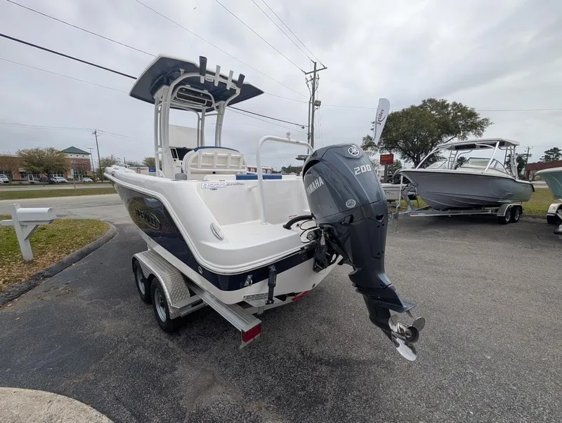 Slide: The Image of 2025 Robalo R222 Explorer boat with Yamaha 200 engine on trailer. - 22