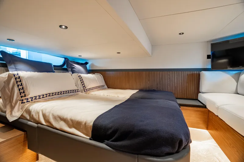 Slide: The Image of Luxurious interior of 2025 ECLIPSE 505 Shadow yacht with cozy bedding and modern design. - 12