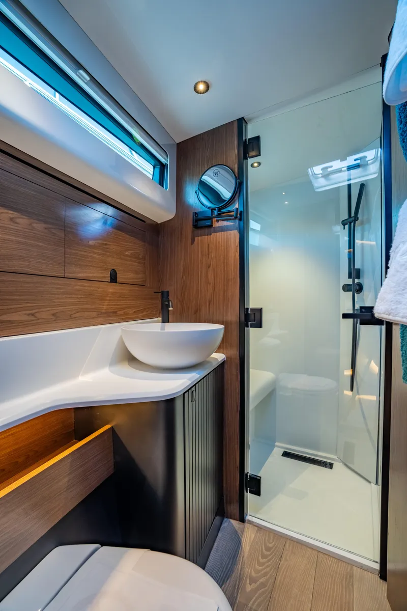 Slide: The Image of Modern bathroom in 2025 ECLIPSE 505 Shadow, featuring sleek design and glass shower. - 14