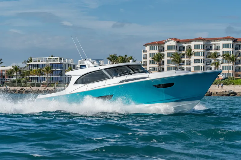 Slide: The Image of ECLIPSE 505 Shadow 2025 cruising near luxury waterfront homes. - 17