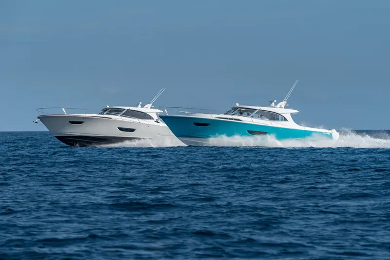 Slide: The Image of Two ECLIPSE 505 Shadow yachts cruising on open water, 2025 model. - 21