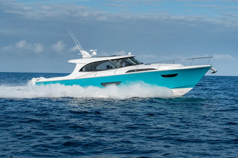 Slide: The Image of 2025 ECLIPSE 505 Shadow yacht cruising on open sea under clear skies. - 27