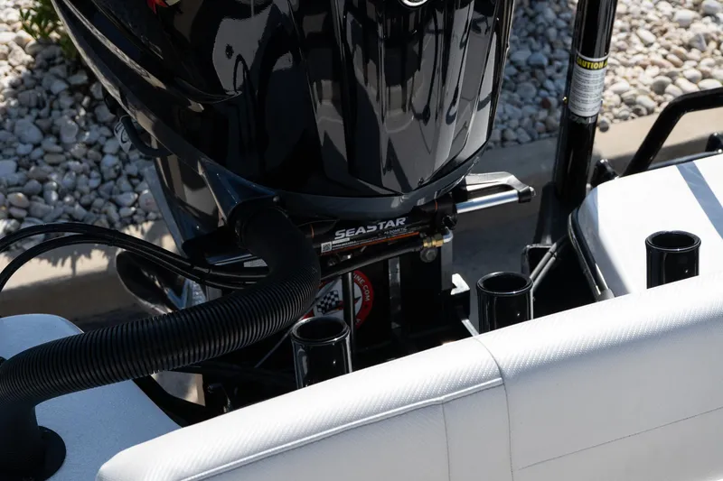 Slide: The Image of 2026 Blazer 675 Ultimate Bay boat engine and seating detail. - 15