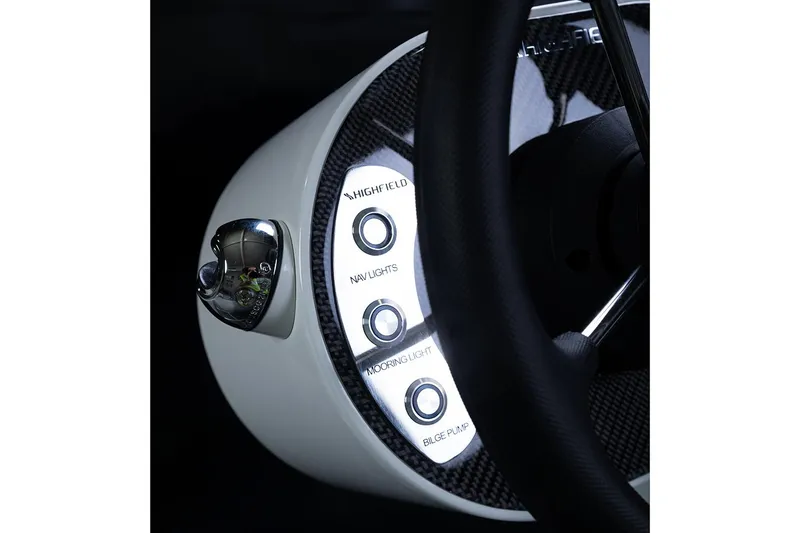 Slide: The Image of 2024 Highfield Classic 380 FCT dashboard with control buttons and steering wheel. - 5