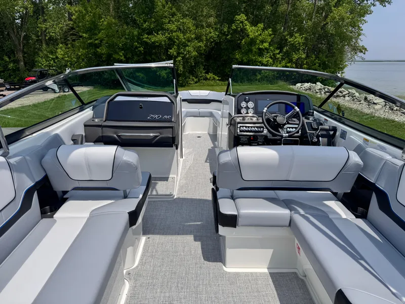 Slide: The Image of 2017 Chaparral 246 SSi boat interior with plush seating and modern design. - 11
