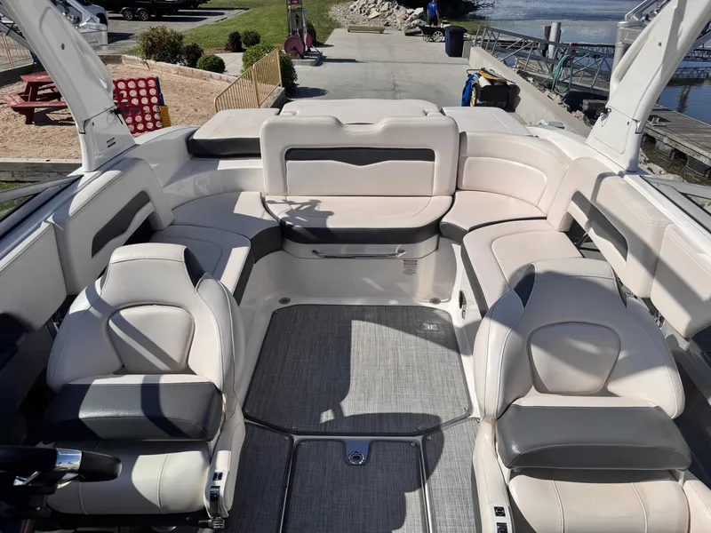 Slide: The Image of 2017 Chaparral 246 SSi boat interior with comfortable seating and modern design. - 13