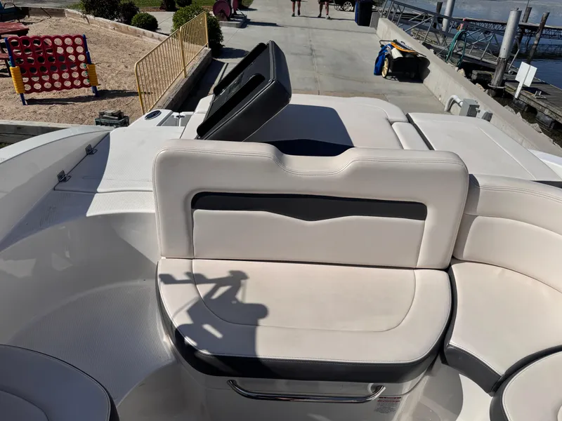 Slide: The Image of 2017 Chaparral 246 SSi boat interior with open windshield and dashboard view. - 14