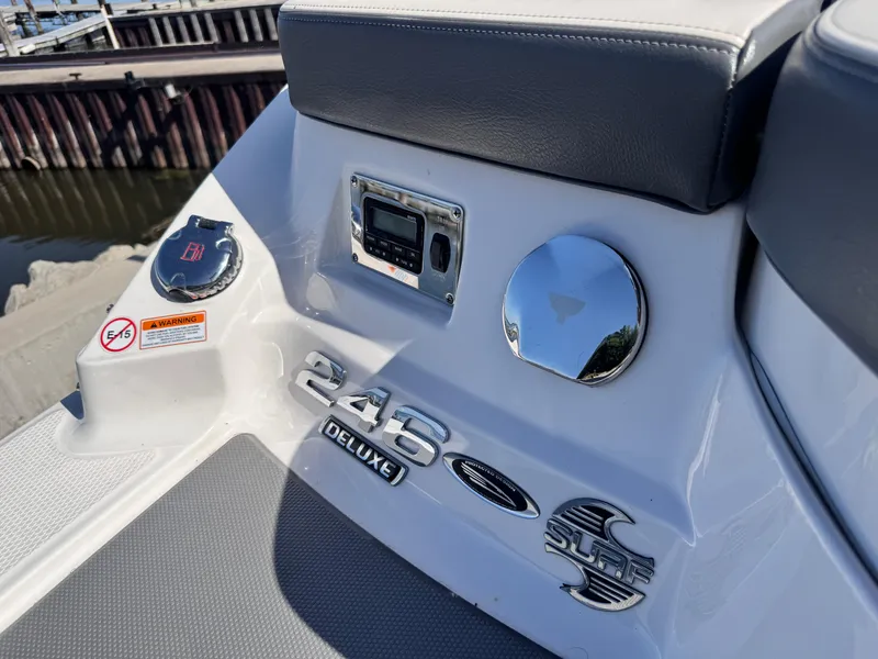 Slide: The Image of Dashboard of a 2017 Chaparral 246 SSi boat with digital display and gauges. - 24