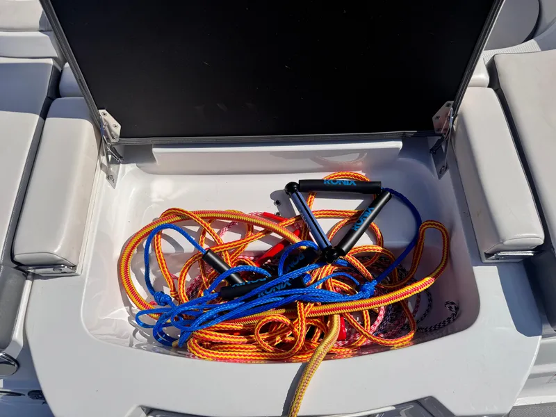 Slide: The Image of Steering wheel of 2017 Chaparral 246 SSi boat with control buttons and gauges. - 25