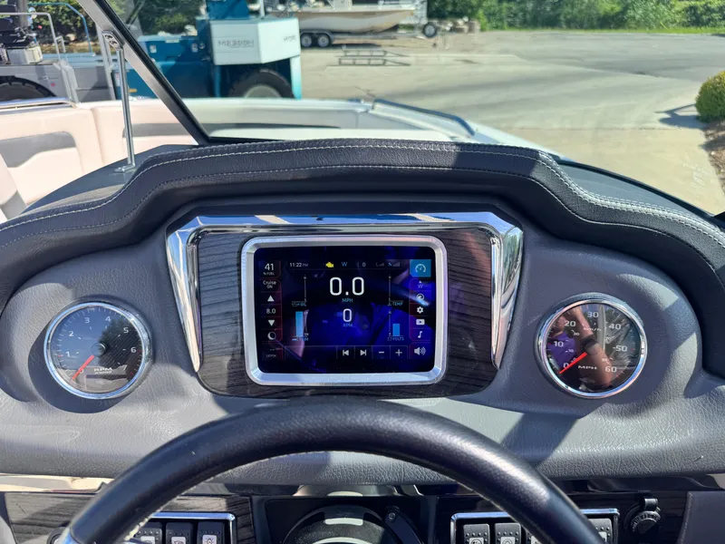 Slide: The Image of 2017 Chaparral 246 SSi boat interior with toilet and sink. - 27