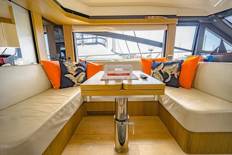 Slide: The Image of Luxurious interior of 2017 Absolute 50 Fly yacht with elegant seating and vibrant cushions. - 18