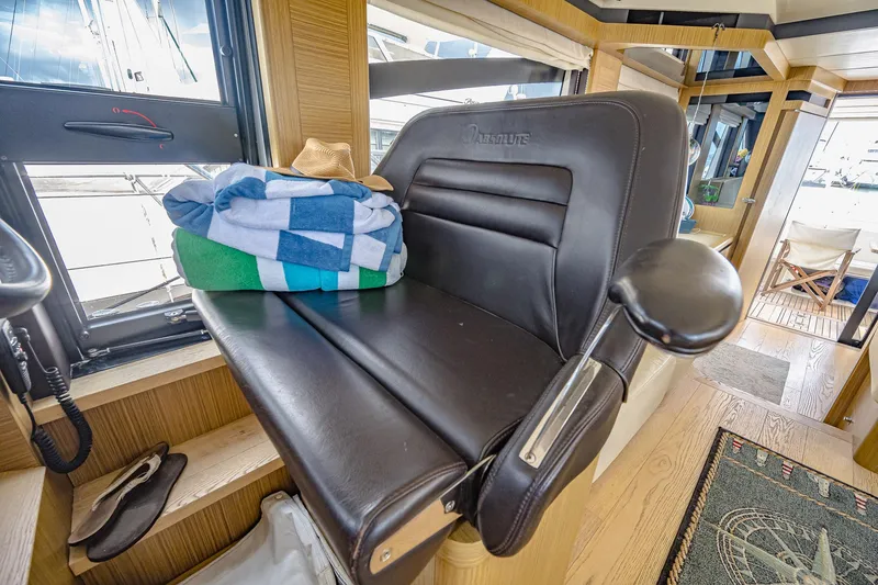 Slide: The Image of Luxurious interior of 2017 Absolute 50 Fly yacht with leather seating and nautical decor. - 20