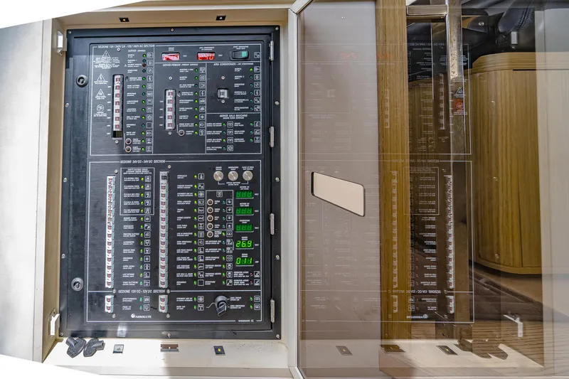 Slide: The Image of Electrical control panel on a 2017 Absolute 50 Fly yacht. - 32