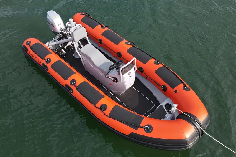 The Image of 2026 Highfield Patrol 460 inflatable boat on the water. - 0