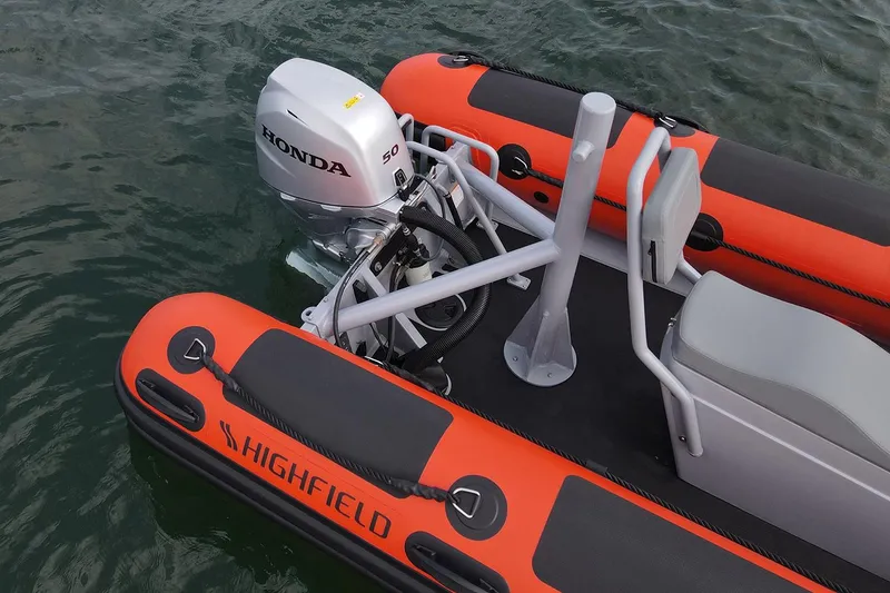 Slide: The Image of 2026 Highfield Patrol 460 inflatable boat on water. - 3