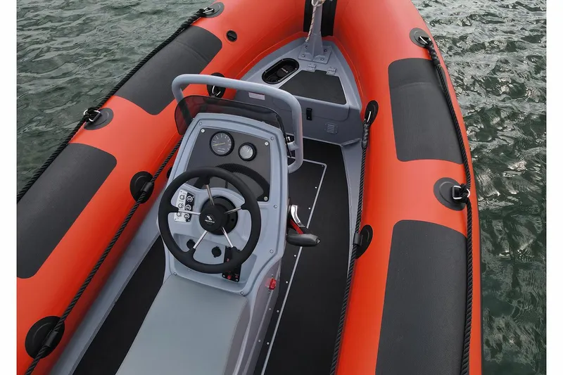 Slide: The Image of Highfield Patrol 460 boat with Honda engine on water, year 2026. - 5