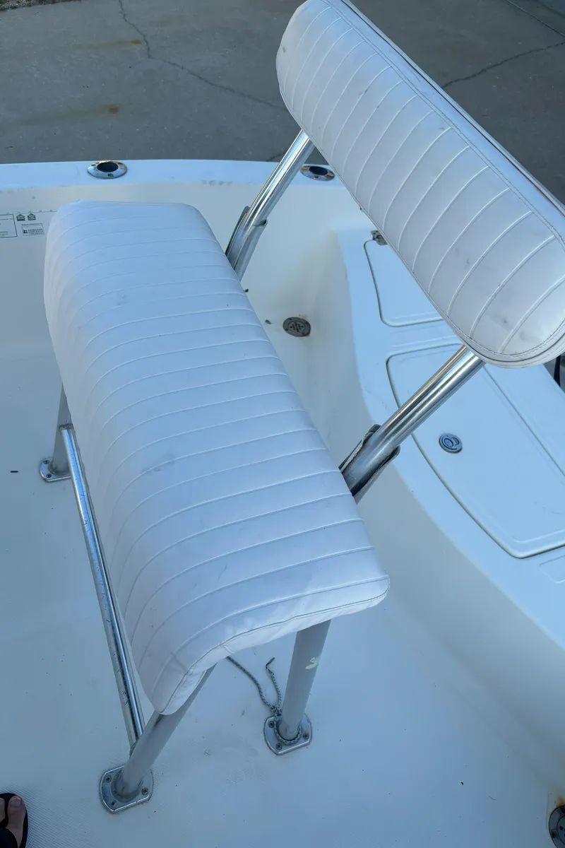Slide: The Image of White cushioned seats on a 2003 Pioneer 175 Bay Sport boat. - 6