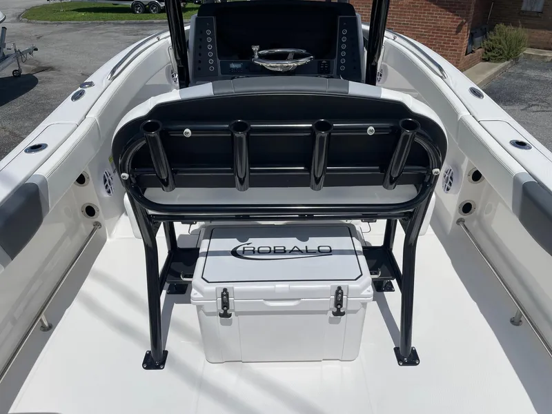 Slide: The Image of 2025 Robalo R230 Center Console boat interior with seating and storage. - 6