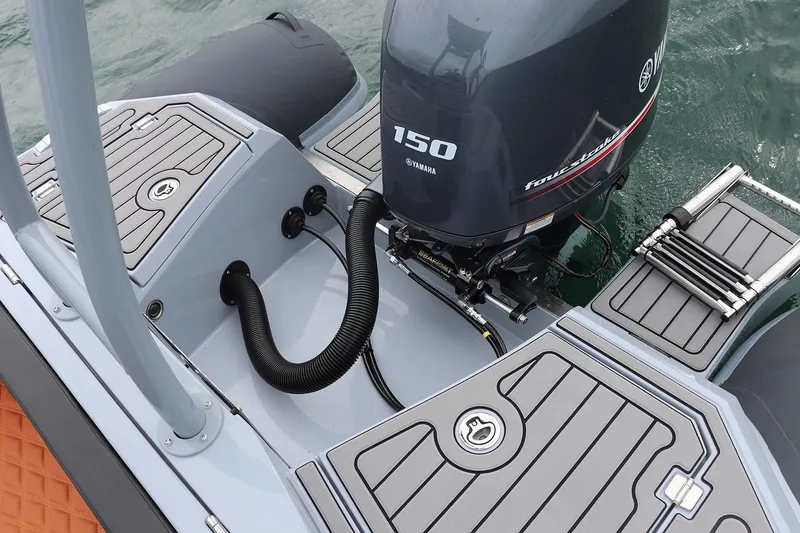 Slide: The Image of 2025 Highfield Sport 650 boat with Yamaha 150 engine, featuring sleek deck design. - 5