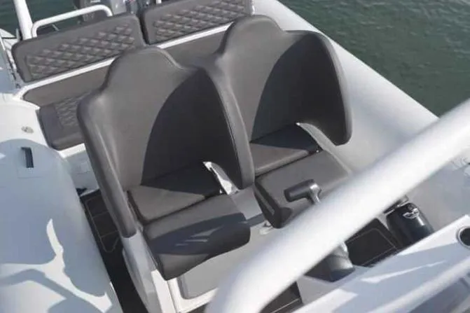 Slide: The Image of 2025 Highfield Sport 660 boat seats, featuring sleek black design and modern comfort. - 4