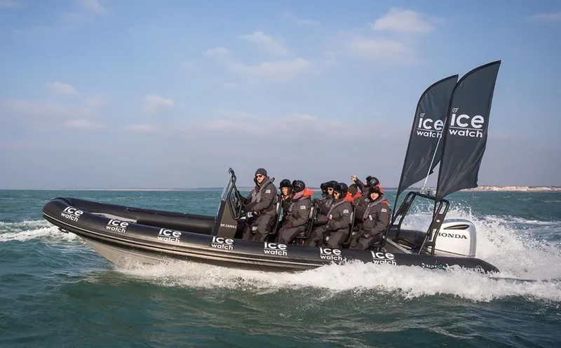 Slide: The Image of 2024 Highfield Patrol 760 boat speeding on water with passengers in gear. - 4