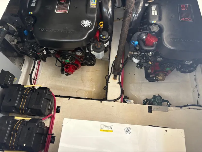 Slide: The Image of Engine compartment of 2013 Cruisers Yachts 350 Express with dual Volvo Penta engines. - 18