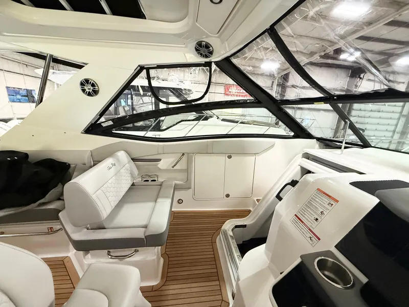 Slide: The Image of 2025 Sea Ray Sundancer 320 interior with sleek seating and modern design. - 7