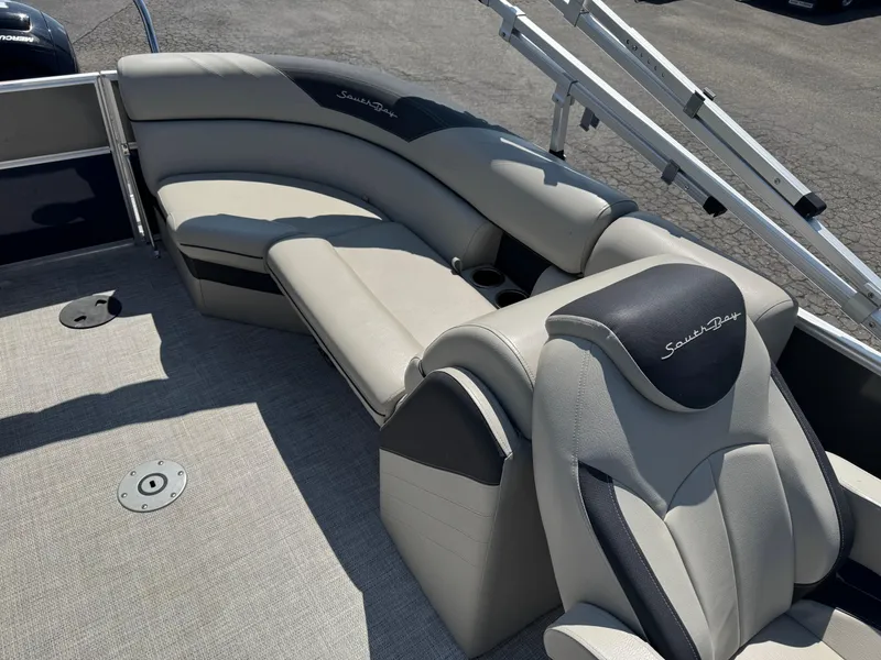 Slide: The Image of 2023 South Bay 224RS LE 2.75 Tritoon interior with luxurious seating and modern design. - 11