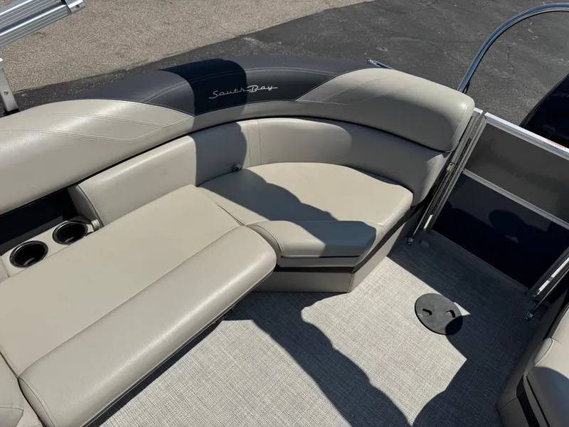 Slide: The Image of 2023 South Bay 224RS LE 2.75 Tritoon interior seating with cup holders. - 12