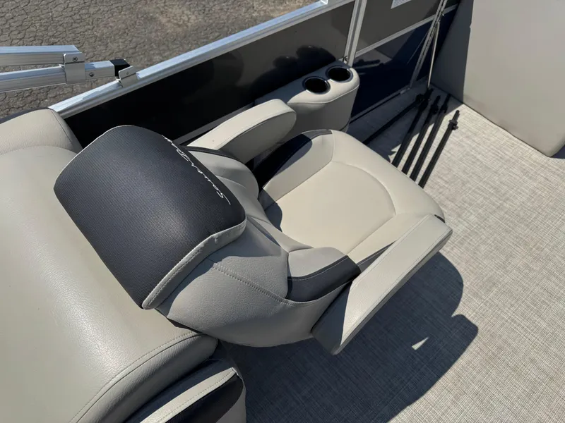 Slide: The Image of Luxurious seating on 2023 South Bay 224RS LE 2.75 Tritoon boat with cup holders. - 14
