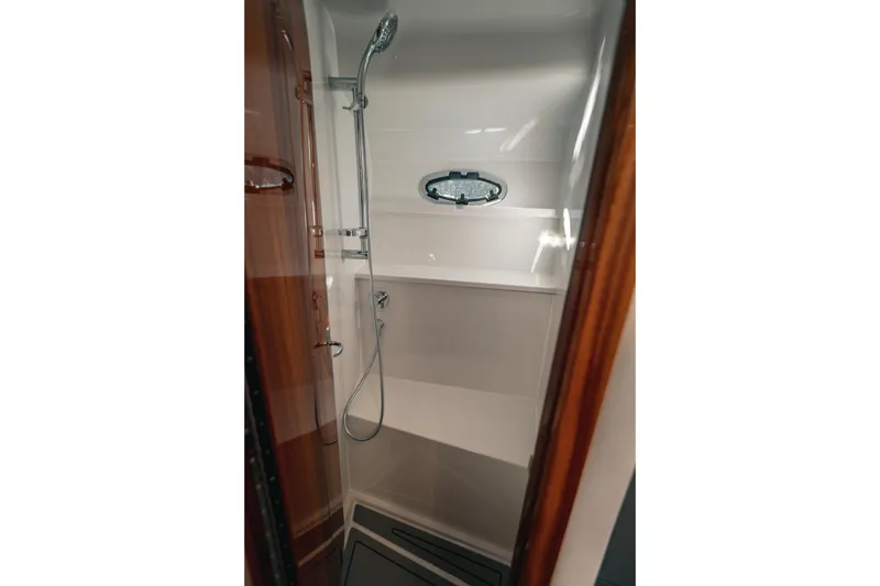 Slide: The Image of Shower area in 2027 Lindell 38' yacht, featuring sleek design and modern fixtures. - 14