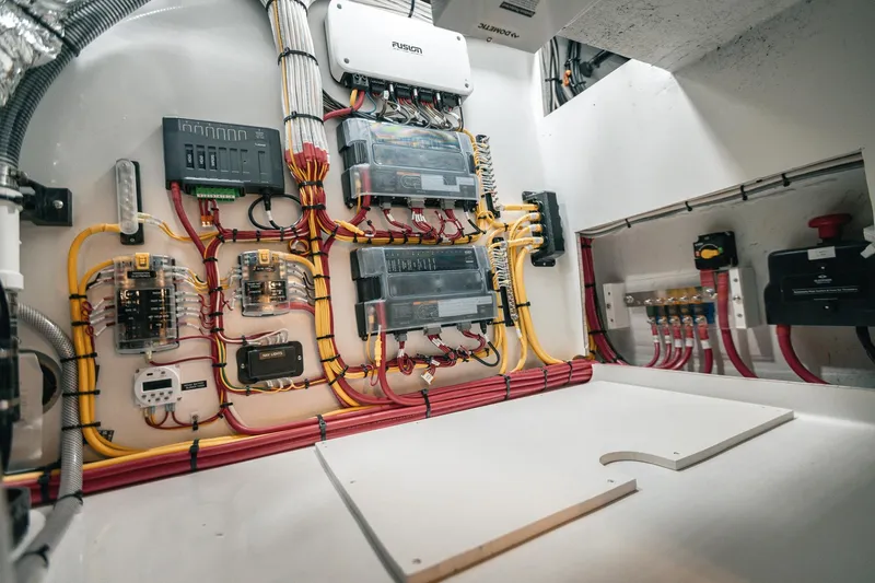 Slide: The Image of Electrical system of a 2027 Lindell 38' boat, showcasing organized wiring and components. - 15