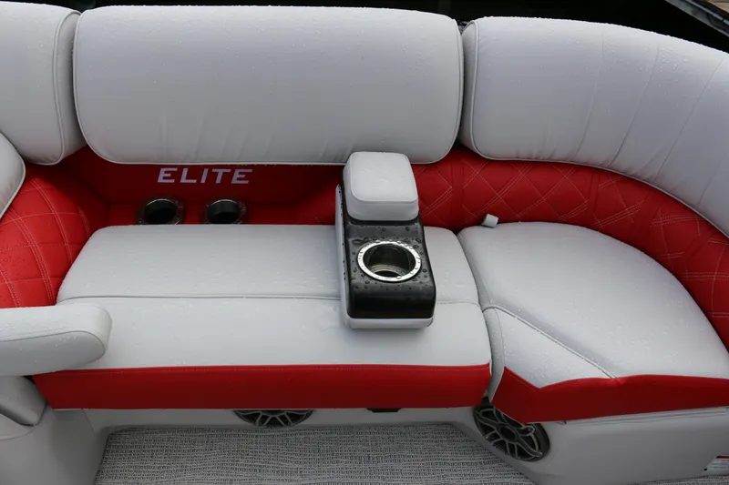 Slide: The Image of Luxurious seating on 2025 SunCatcher Elite 324 RC with cup holders and red accents. - 11