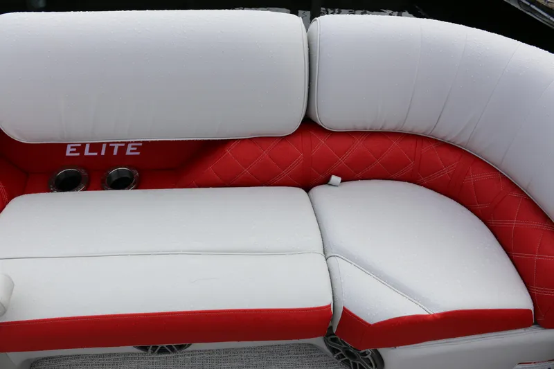 Slide: The Image of Luxurious white and red seating on 2025 SunCatcher Elite 324 RC boat. - 12