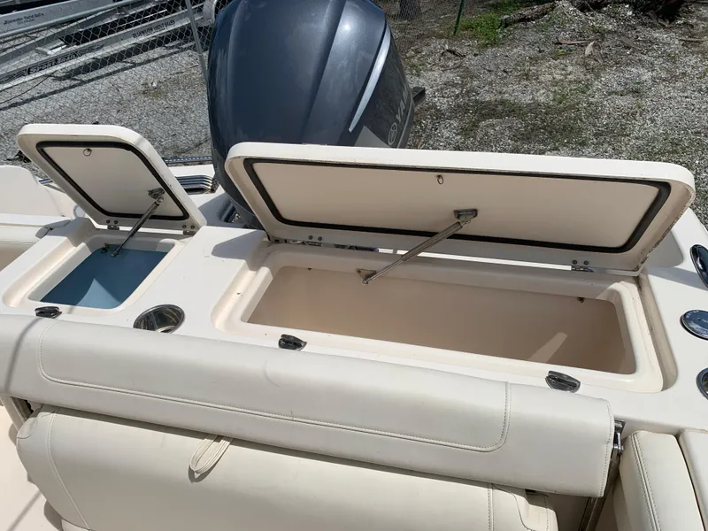 Slide: The Image of Open storage compartments on a 2020 Grady-White 236 Fisherman boat. - 13