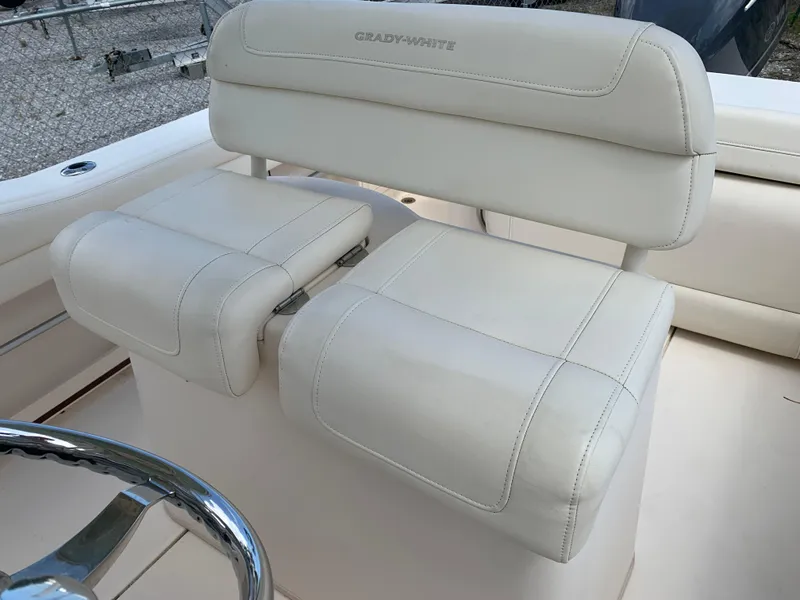Slide: The Image of 2020 Grady-White 236 Fisherman boat seat, white leather upholstery, sleek design. - 19