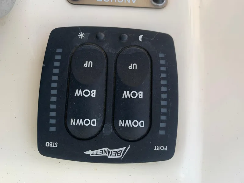 Slide: The Image of Bennett trim tab control panel on 2020 Grady-White 236 Fisherman boat. - 24